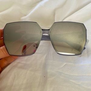 Grey mirrored lenses sunglasses.